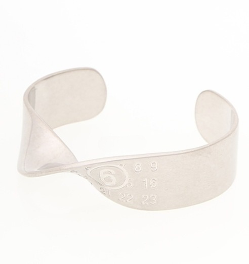 Engraved logo twisted cuff