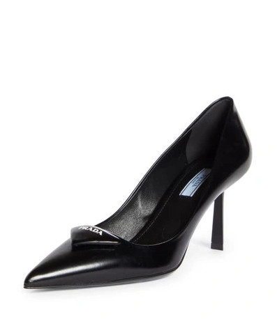 Triangular logo point toe leather pump heels