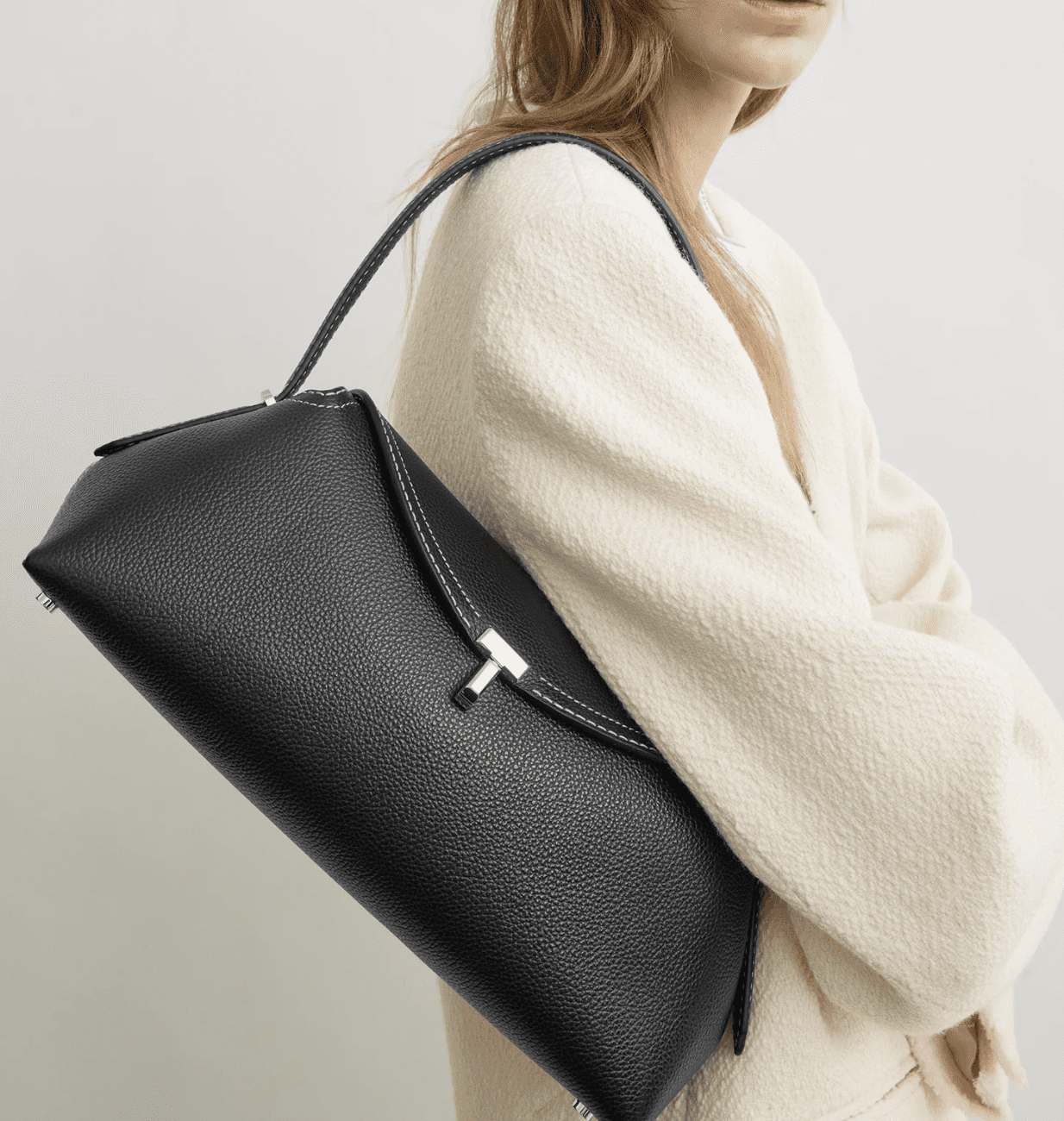 TOTEME T-Lock Grained-Leather Shoulder Bag in Black.