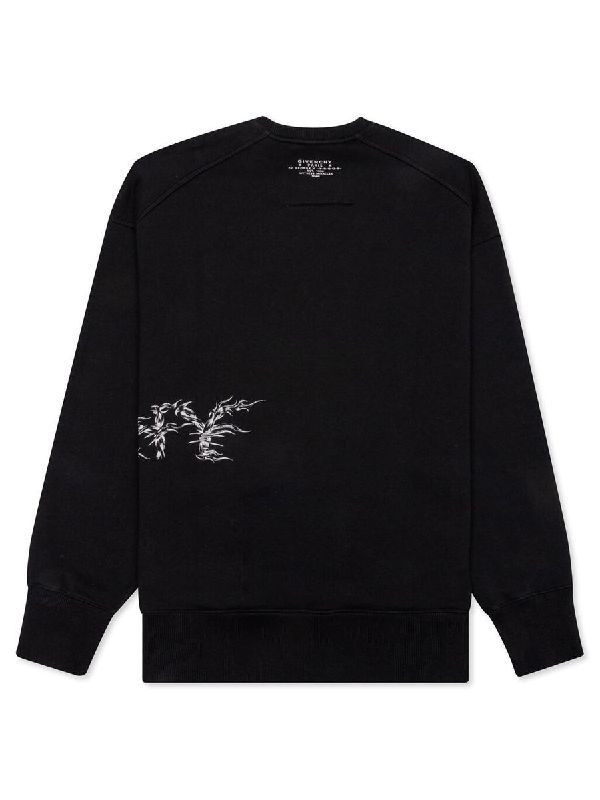 Barbed wire logo over sweatshirt