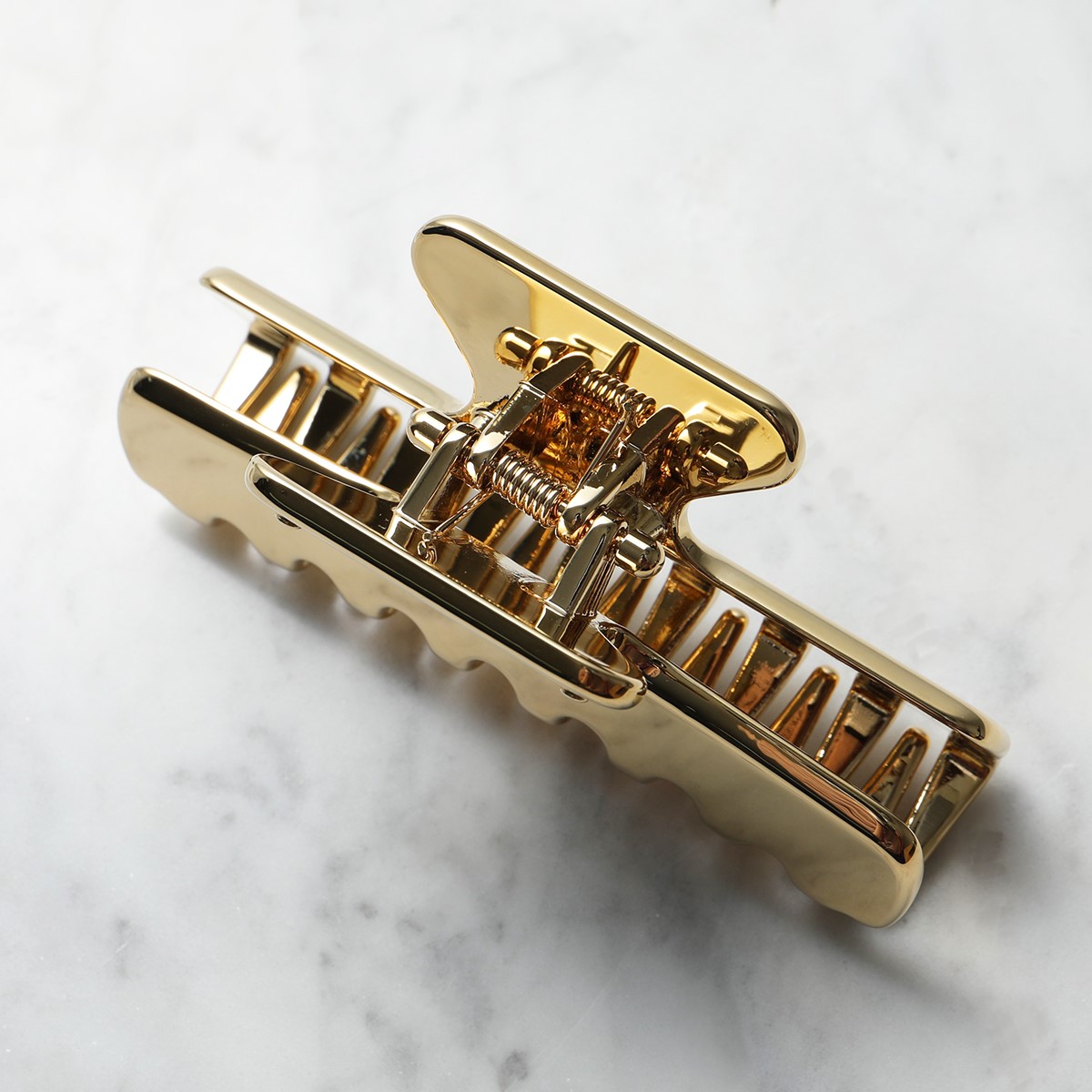 Prada Triangle logo hair clip