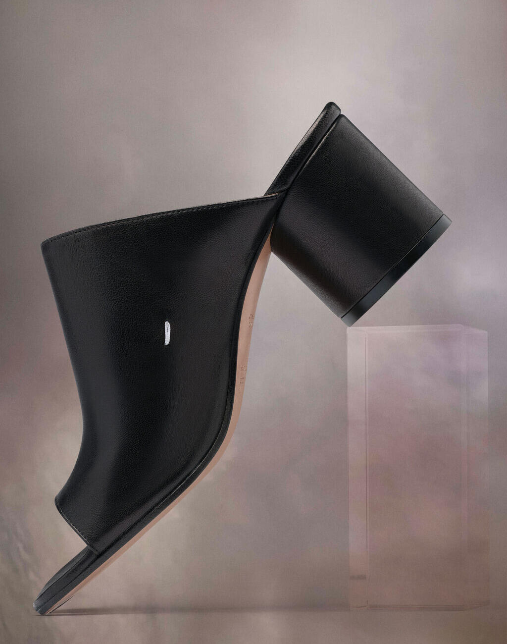 Tabi heel mules in Black