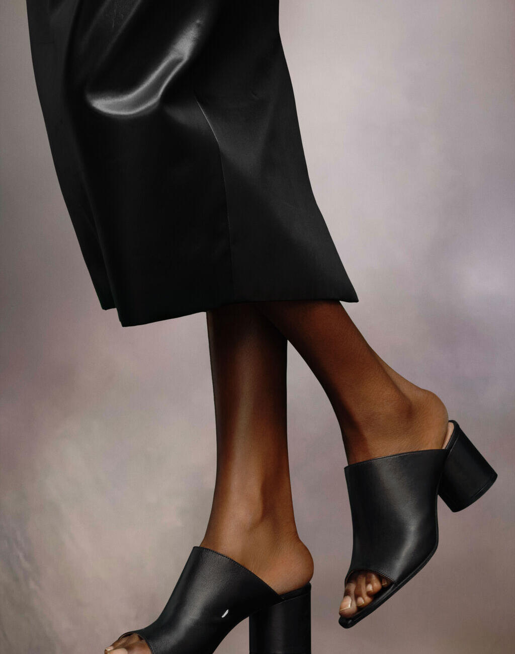 Tabi heel mules in Black