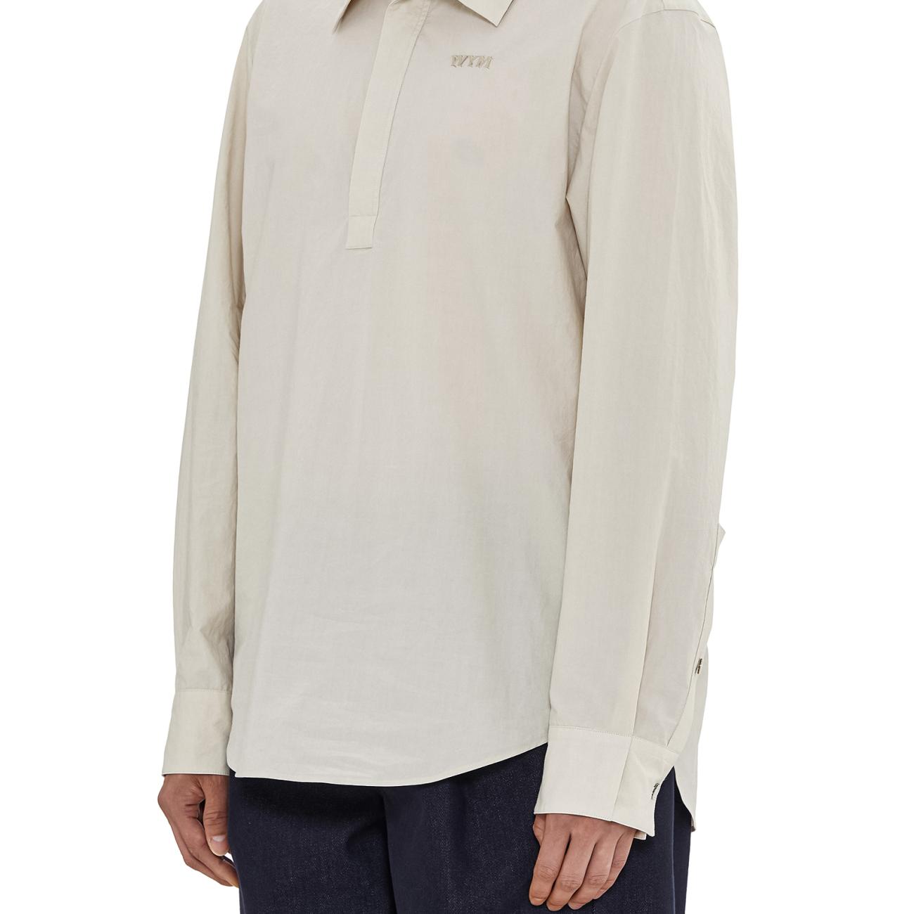 Beige embroidered polo shirt