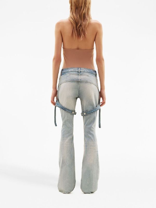 Suspender-embellished washed denim