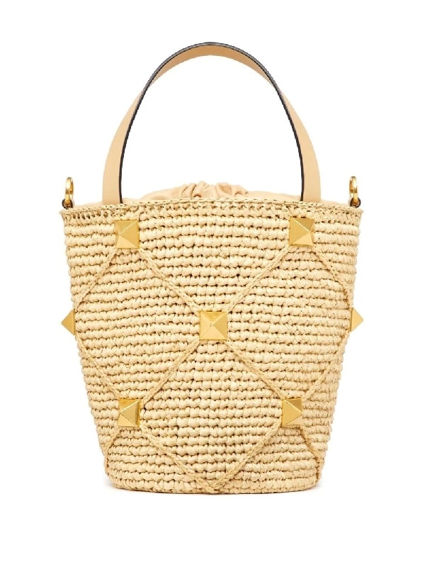 Roman studded raffia bucket bag