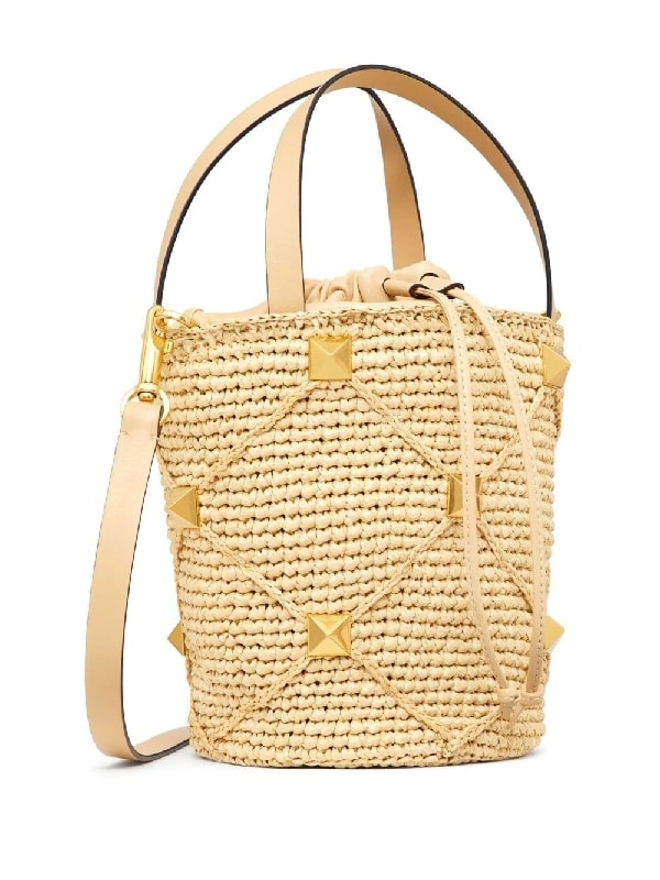 Roman studded raffia bucket bag