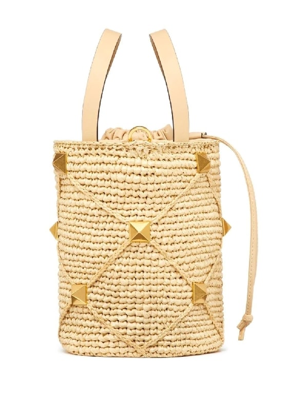 Roman studded raffia bucket bag