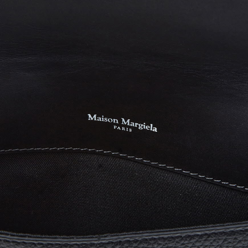 stitch logo clutch bag