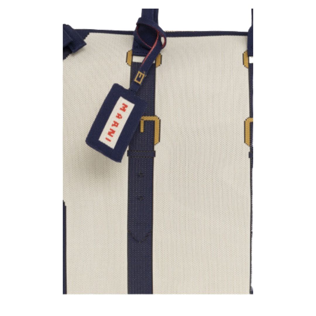 Trompe l'oeil jacquard travel bag