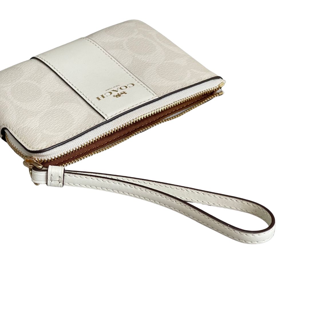 Corner Zip Wristlet In Signature Canvas