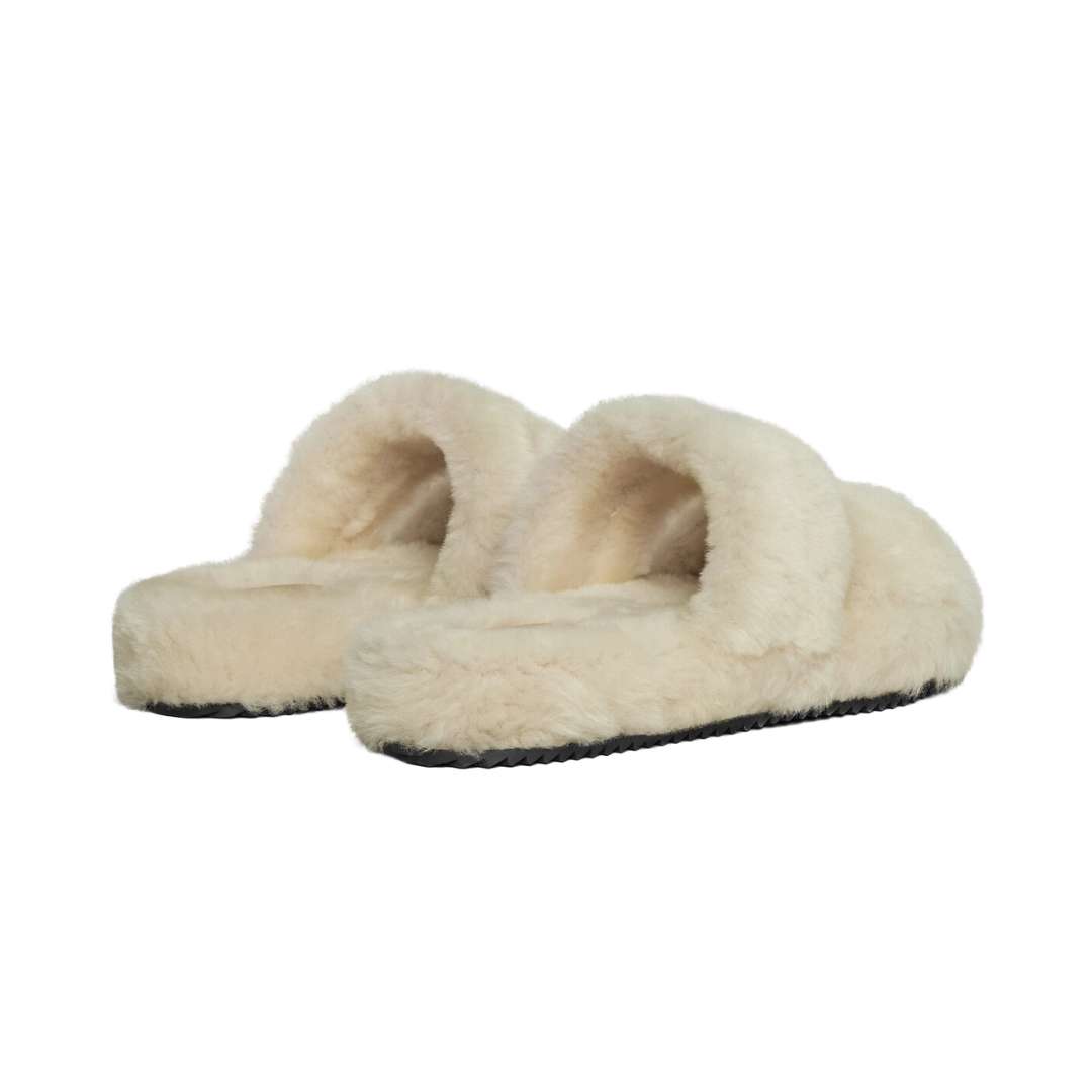 Fur Slides Triomphe in Shearling